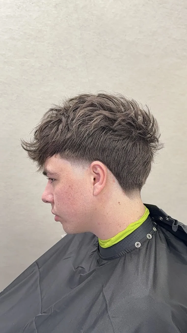 A textured crop with a longer top and tapered sides